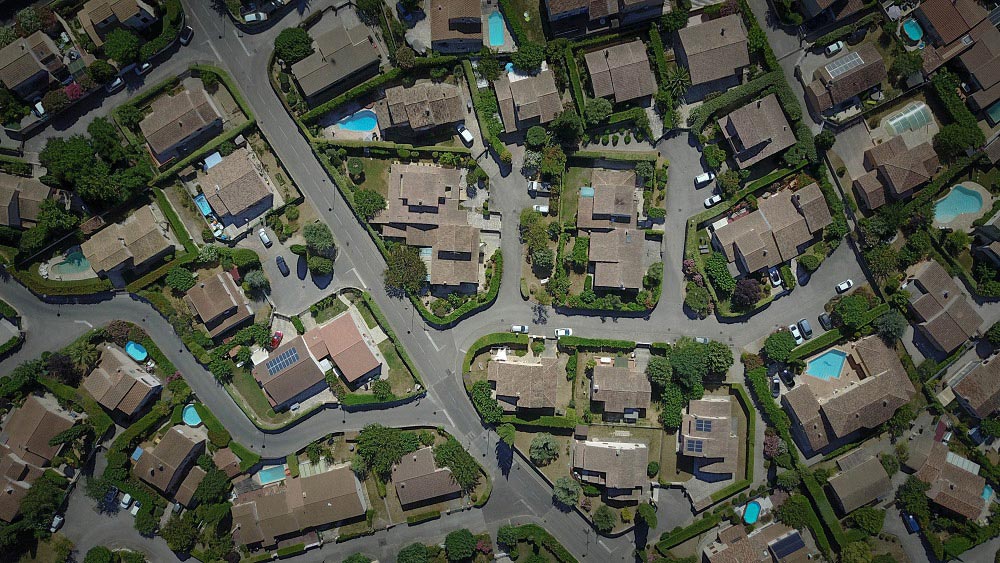 aerial view of a neighborhood representing the real estate market